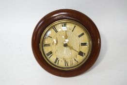 A Black Forest wall clock with mahogany surround,
