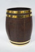 A brass bound oak barrel,
