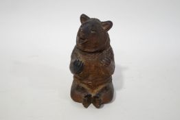 A Black Forest bear inkwell with glass liner,