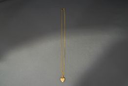 A 9 carat gold chain, of filed curb links, 51 cm long, 2.