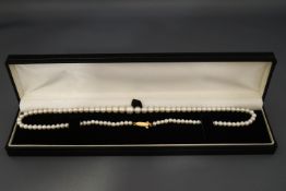 A graduated cultured pearl necklace, the ninety eight pearls of approximately 3.4-7.