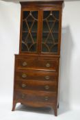 A George IV mahogany secretaire bookcase,