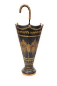 A 19th century Toleware umbrella stand, with panelled decoration with foliage and flowers,