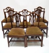 A set of four George III style mahogany chairs, with pierced vase shape splats,