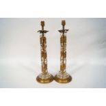 A pair of early-mid 20th century brass table lamps,