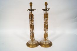 A pair of early-mid 20th century brass table lamps,
