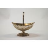 A Victorian silver swing handle sugar basket, by Charles Stuart Harris, London 1883,