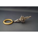 A Victorian silver rattle with ivory teether