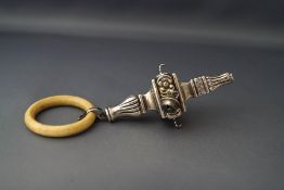 A Victorian silver rattle with ivory teether