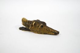 A Victorian gilt letter clip in the form of a greyhound's head with glass eyes