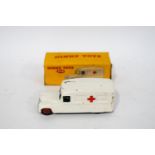 A Dinky die-cast Daimler Ambulance, no 253,