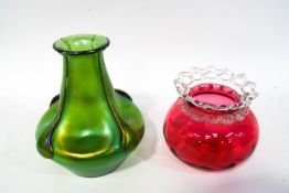 A Loetz style iridescent green four sided vase, 16cm high, and a Cranberry glass bowl,