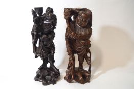 Two Chinese root carvings of bearded wise men,
