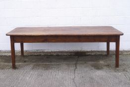 A large Victorian pine kitchen table with quadruple plank top and two frieze drawers on square