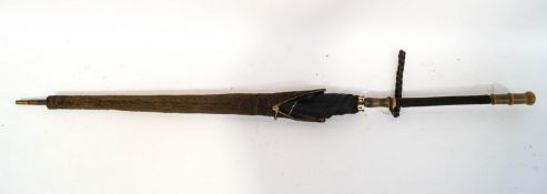 An Edwardian ladies black silk umbrella with matching umbrella zipped cover and handle cover