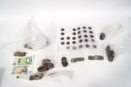 A quantity of British and foreign coinage, including Victorian pennies, farthings,