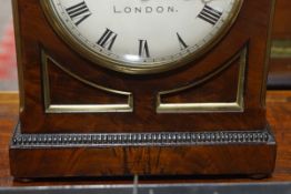 A Regency Cuban mahogany cased mantel clock, with single fusee movement, the dial signed Frodsham,