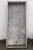 An old lead and wooden meat salting trough,
