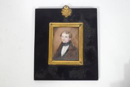 English school, early 19th century portrait miniature of a gentleman wearing a brown jacket,
