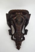 A 19th century carved oak wall bracket in the Jacobean style,