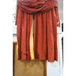 A pair of red and gold flower embroidered curtains with attached pelmet,