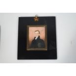 English school, early 19th century, portrait miniature of a gentleman wearing a black jacket,