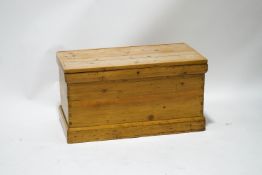 A small pine blanket box,
