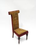 A Victorian rosewood pre dieu with original tapestry and red velvet upholstery