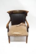 A Regency mahogany elbow chair with scroll arms,