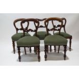 A matched set of five balloon back chairs,