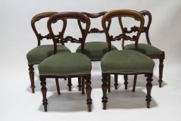 A matched set of five balloon back chairs,