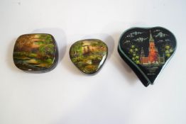 Three Russian lacquered boxes with hand painted decoration, two with forest scenes, signed,