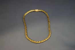 A 14 carat gold necklace, of fancy plaited style links, 42 cm long,