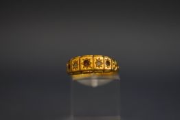 An Edwardian 18 carat gold ring, Chester 1904, some settings vacant, 3.