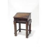 A late 17th century and later oak Bible box on later stained black stand,