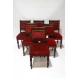 A set of six Victorian mahogany dining chairs, with carved reeded detail,