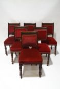 A set of six Victorian mahogany dining chairs, with carved reeded detail,