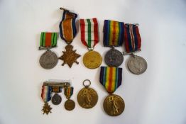 Five WWI medals, each named to a different person, comprising: 1914 Star, 10442 Pte A.