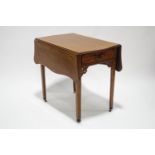 A 19th century mahogany pembroke tea table, having shaped flaps,