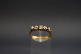 A five stone diamond ring, stamped '18ct & Pt',