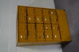 A 20th century painted metal industrial filing cabinet of twenty drawers,