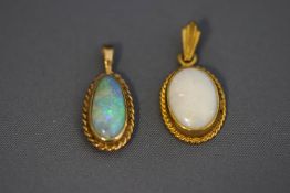 A 9 carat gold mounted opal pendant;
