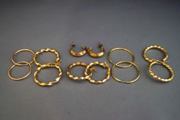 A collection of five hoop earrings, hallmarked 9 carat or stamped '375', 5.