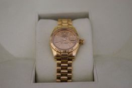 A lady's 18 carat gold Rolex Oyster Perpetual Datejust, gilt dial, batons and hands,