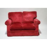 A Laura Ashley two seater sofa in the Padstow design with cranberry upholstery, 134cm wide,