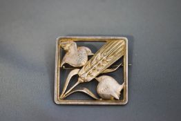 A Georg Jensen silver brooch, designed by Arno Malinowski, number 250, stamped marks,