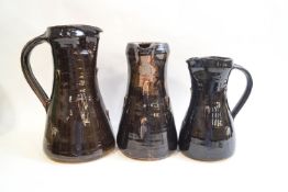 Jeremy Leach (b1941), three Lowerdown pottery stoneware jugs of graduated size,