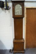A 20th century eight day oak longcase clock, with weights and pendulum,