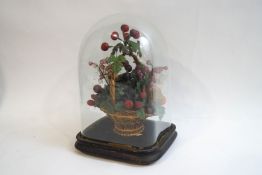 A Victorian model of a basket of fruit, under a glass square sided dome and stand,