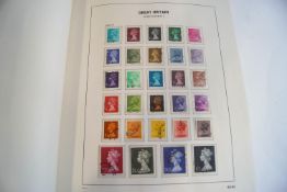 A collection of Great Britain stamps in two Davo albums, A Q.V to Q.E.
